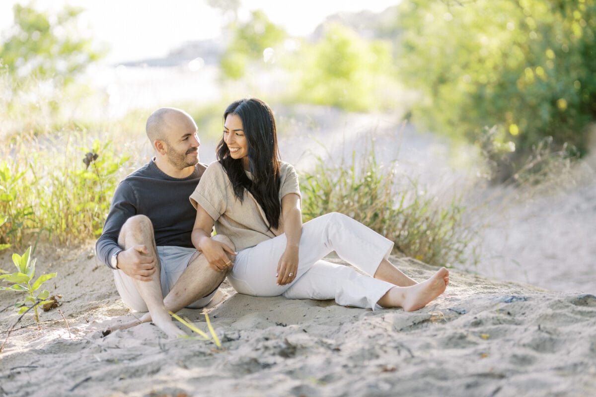 Engagement Photo of couple on a beach in Niagara by Morning Light Photography